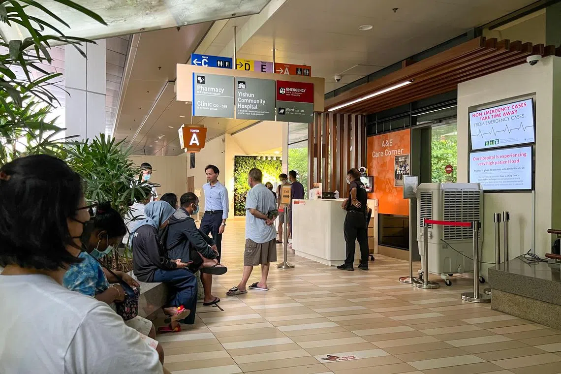 People waiting outside Khoo Teck Puat Hospital’s accident and emergency department, April 20, 2023.