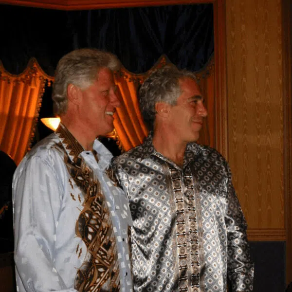 Former US president Bill Clinton standing with Jeffrey Epstein in this image released by the US Department of Justice in Washington DC, on Dec 19.