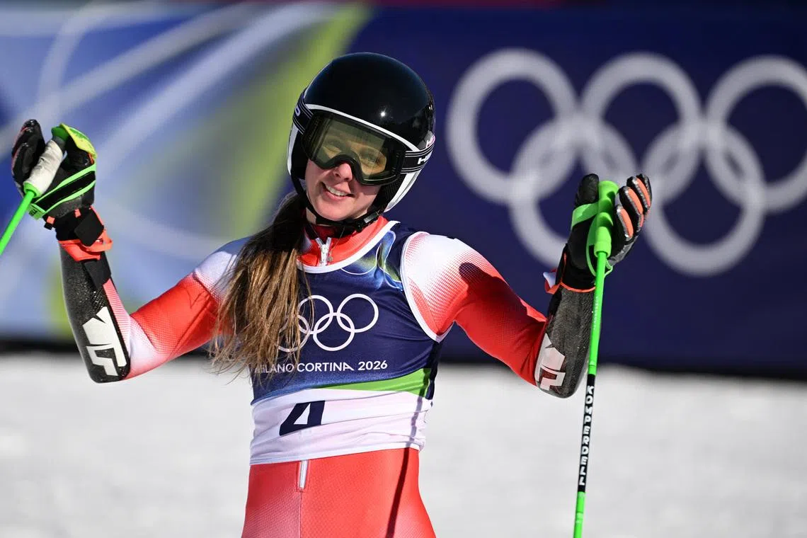 Milano Cortina 2026 Olympics - Alpine Skiing - Women's Giant Slalom Run 2 - Tofane Alpine Skiing Centre, Belluno, Italy - February 15, 2026. Camille Rast of Switzerland reacts after her second run in the Women's Giant Slalom REUTERS/Jennifer Lorenzini