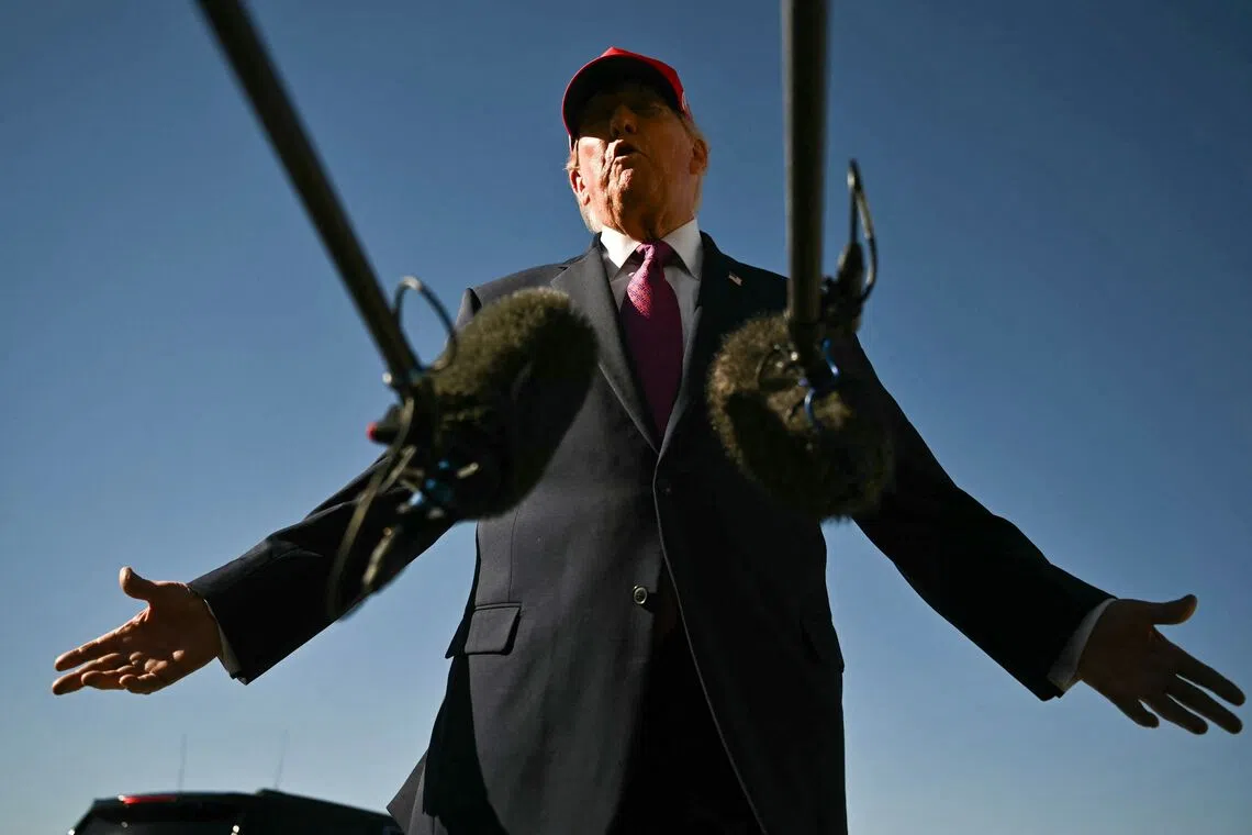 US President Donald Trump speaks to the press after addressing a campaign rally at Laughlin/Bullhead International Airport in Arizona on Oct 14.