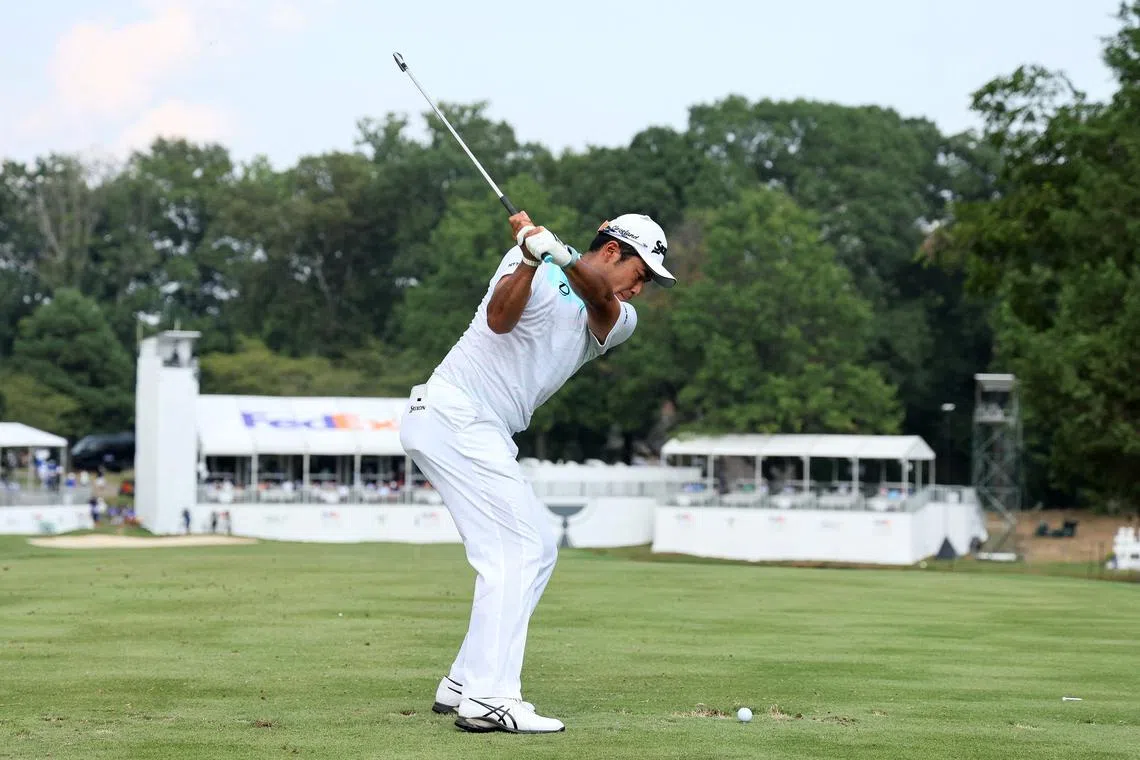 Hideki Matsuyama of Japan plays his shot from the 14th tee during the first round of the FedEx St. Jude Championship at TPC Southwind on Aug 15, 2024.