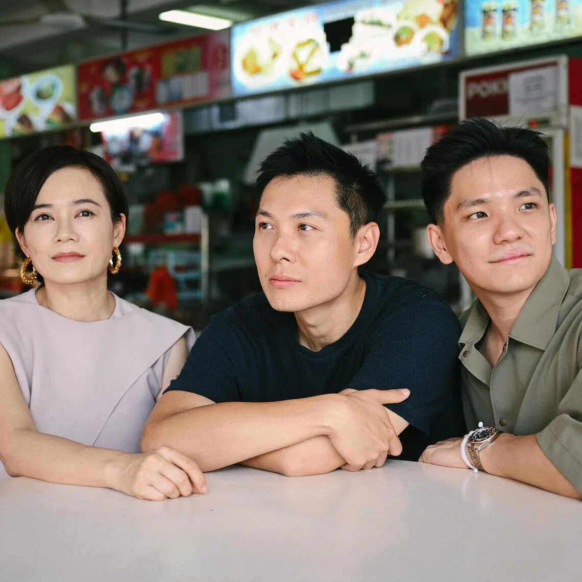 (From left) Yeo Yann Yann, Anthony Chen and Koh Jia Ler from the film We Are All Strangers at Tong Bee coffeeshop on Aug 4.