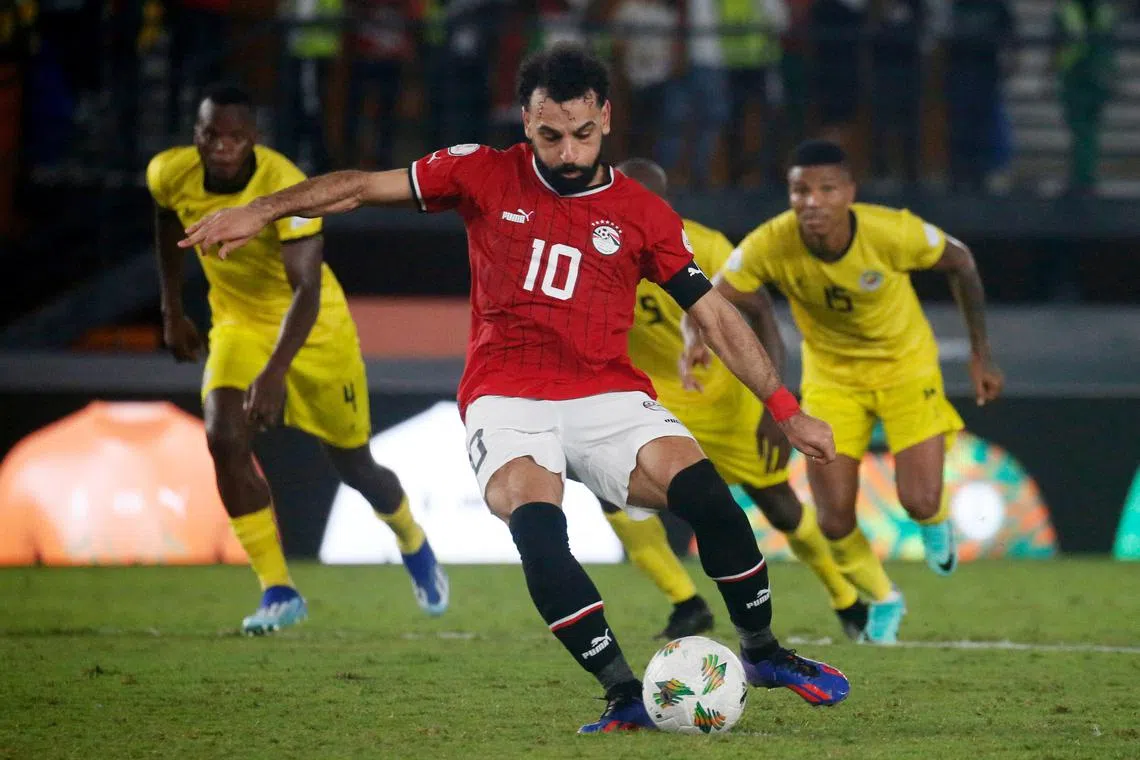 Egypt's Mohamed Salah scoring a late equaliser from the penalty spot in their 2-2 draw with Mozambique in Africa Cup of Nations Group B on Jan 14 at the Felix Houphouet Boigny Stadium in Abidjan.
