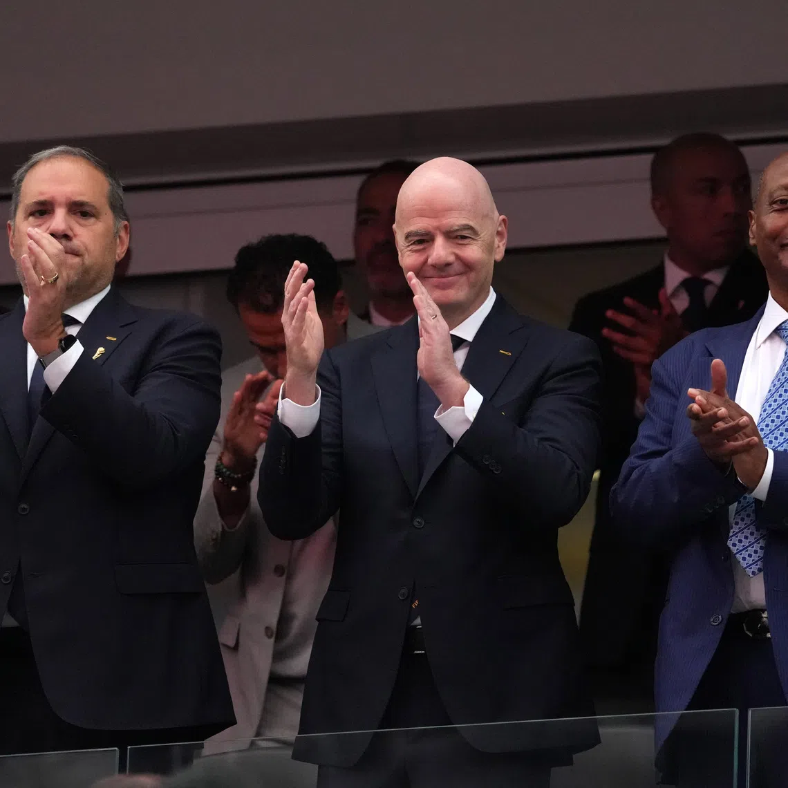 Jun 28, 2026; Inglewood, California, USA; CONCACAF President Victor Montagliani (left), FIFA President Gianni Infantino (center) and CAF President Patrice Motsepe attend a Round of 32 match between South Africa and Canada in the 2026 FIFA World Cup at Los Angeles Stadium. Mandatory Credit: Kirby Lee-Imagn Images