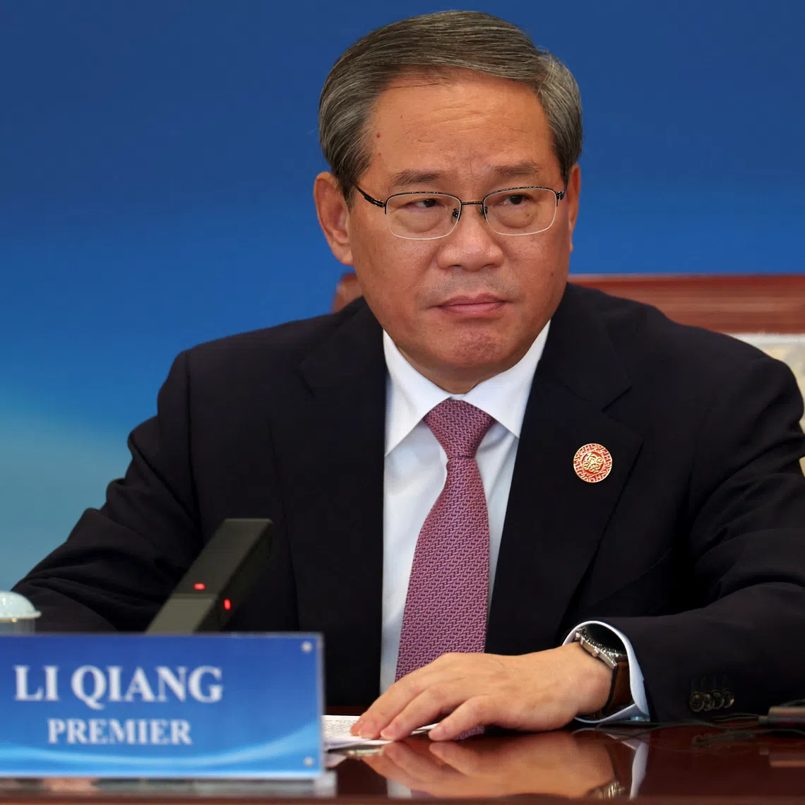Chinese Premier Li Qiang attends the “1+10 Dialogue” with heads of key economic groups in Beijing on Dec 9.