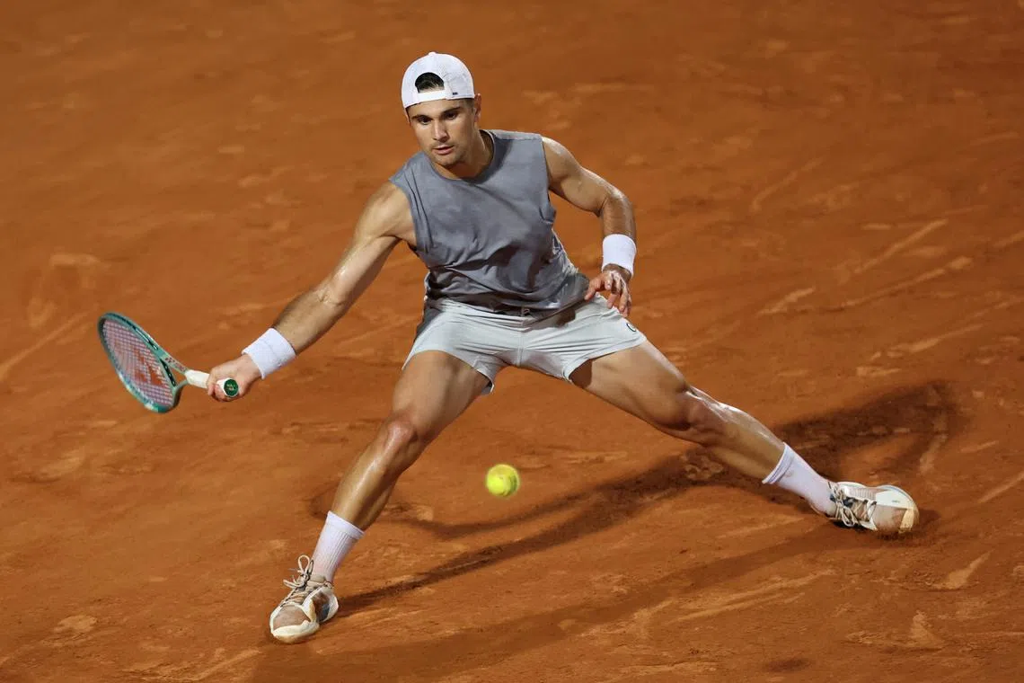 FILE PHOTO: Tennis - Italian Open - Foro Italico, Rome, Italy - May 11, 2024 Marcos Giron of the U.S. in action during his round of 64 match against Russia's Andrey Rublev REUTERS/Claudia Greco/File Photo