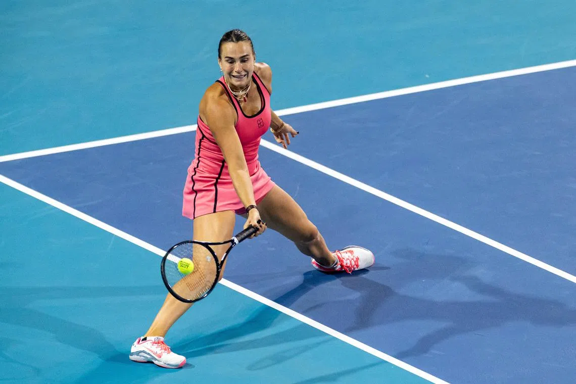 Mar 25, 2026; Miami Gardens, FL, USA; Aryna Sabalenka of Belarus hits a forehand against Hailey Baptiste of the United States in the quarter finals of the women’s singles at the Miami Open at Hard Rock Stadium. Mandatory Credit: Mike Frey-Imagn Images