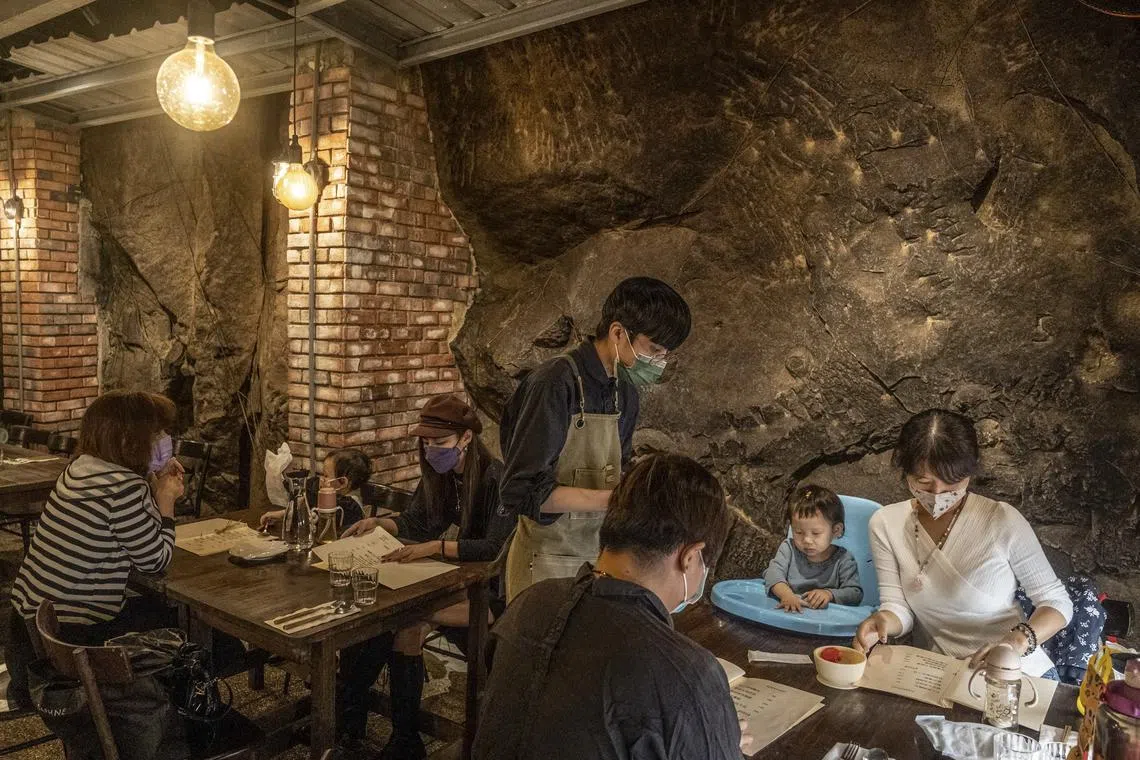 Pufferfish, a restaurant in a converted bunker in Keelung,  Taiwan, on Oct. 20, 2022. Preparing for war over hundreds of years has left a mark on Taiwan with its hundreds of bomb shelters; some are being turned into cultural oases. (Lam Yik Fei/The New York Times