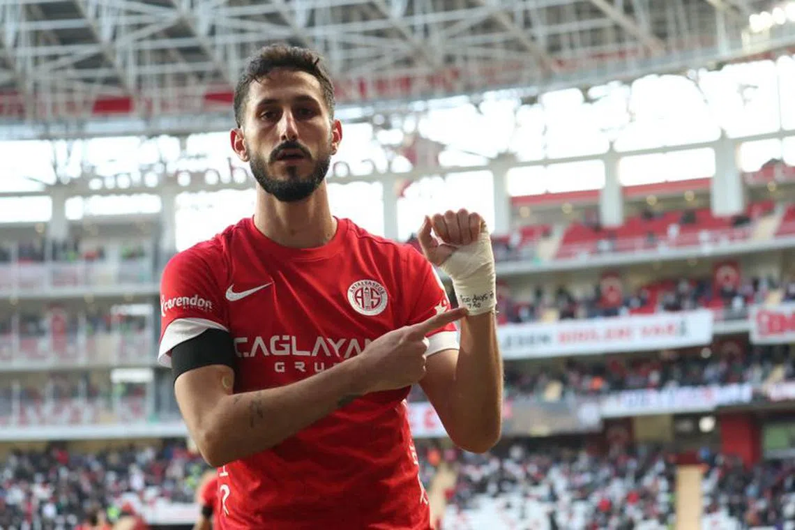 Antalyaspor's Israeli player Sagiv Jehezkel shows his bandage which has \"100 days, 7.10\" written on it, referring to the attack by Hamas on October 7, 2023, after scoring a goal against Trabzonspor during their Turkish Super League soccer match in Antalya, Turkey January 14, 2024.