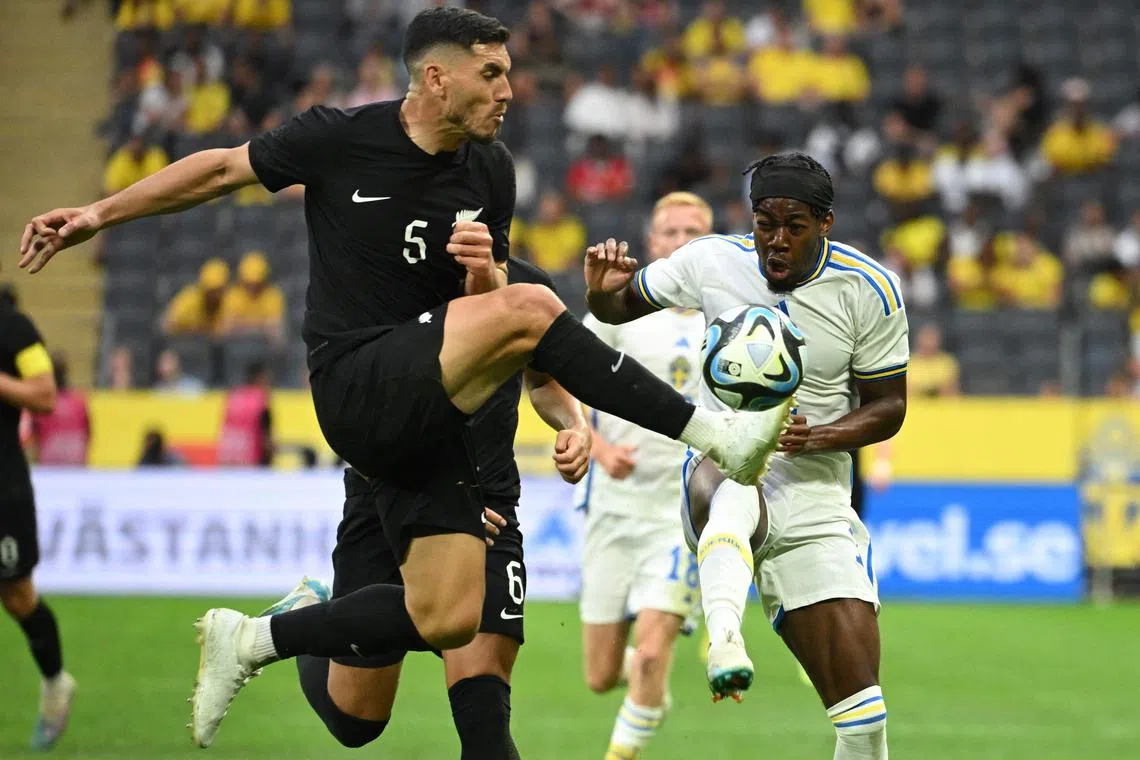 New Zealand defender Michael Boxall (left), pictured in an international friendly against Sweden, was allegedly racially abused during their game against Qatar. 