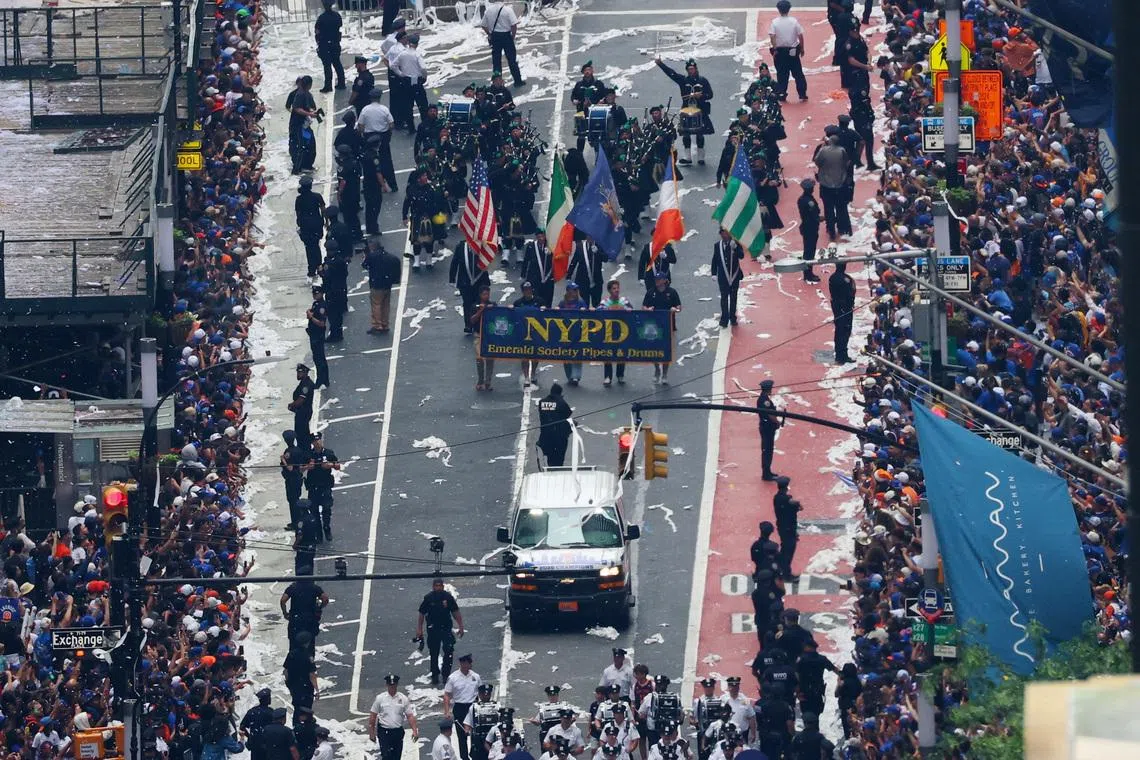 Basketball - NBA - New York Knicks Parade - Woolworth Building, New York City, New York, U.S. - June 18, 2026 General view from the Woolworth Building in New York City of the NYPD police escort as the parade travels along Broadway REUTERS/Mike Segar