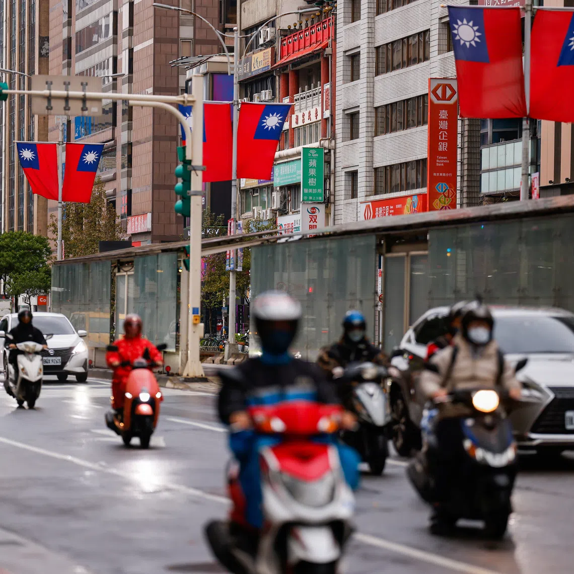 Taiwan flags can be seen in the streets in Taipei City, Taiwan  January 3, 2024. REUTERS/Ann Wang