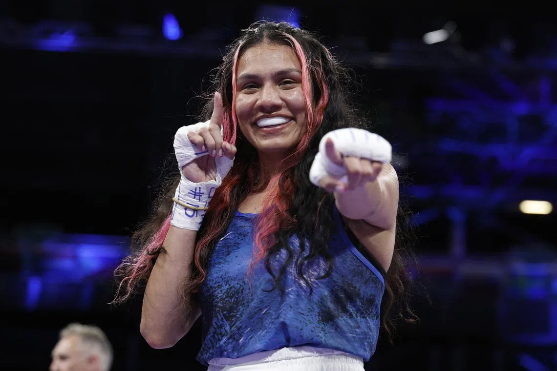 Paris 2024 Olympics - Boxing - Women's 60kg - Prelims - Round of 32 - North Paris Arena, Villepinte, France - July 27, 2024. Jajaira Gonzalez of United States celebrates after winning her bout against Estelle Mossely of France REUTERS/Peter Cziborra
