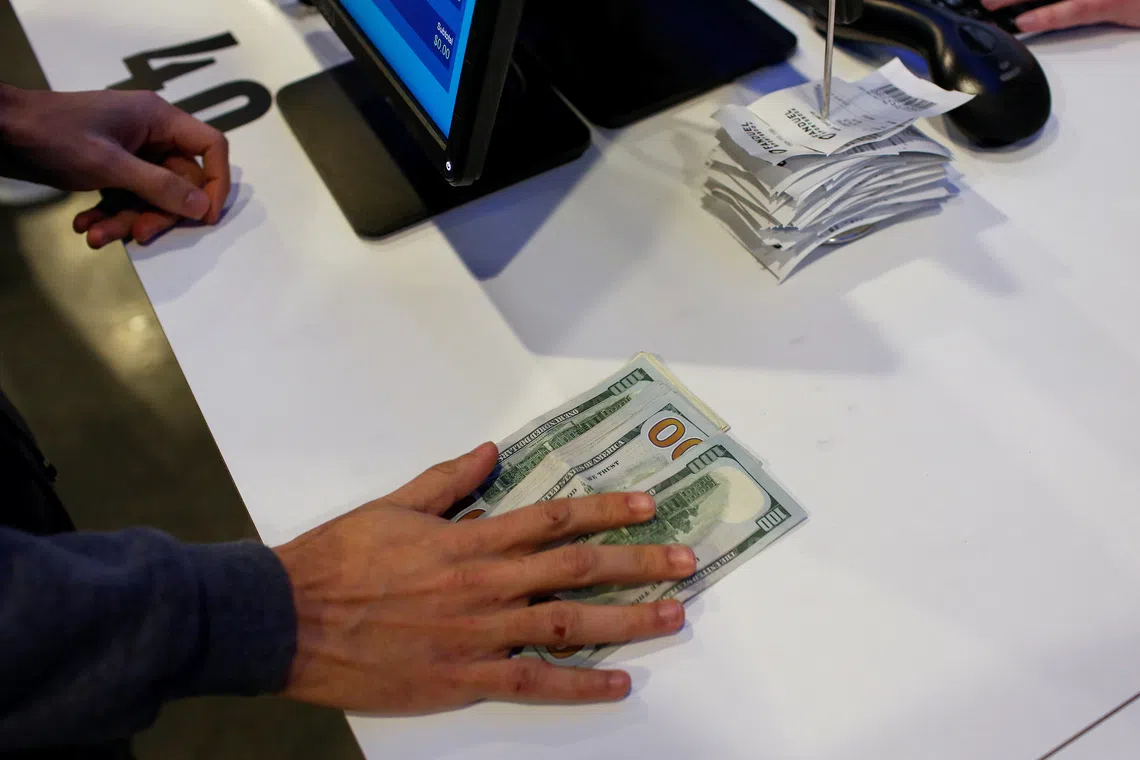 A man makes his bets during the Super Bowl LIII in East Rutherford, New Jersey, U.S., February 3, 2019. REUTERS/Eduardo Munoz/File Photo