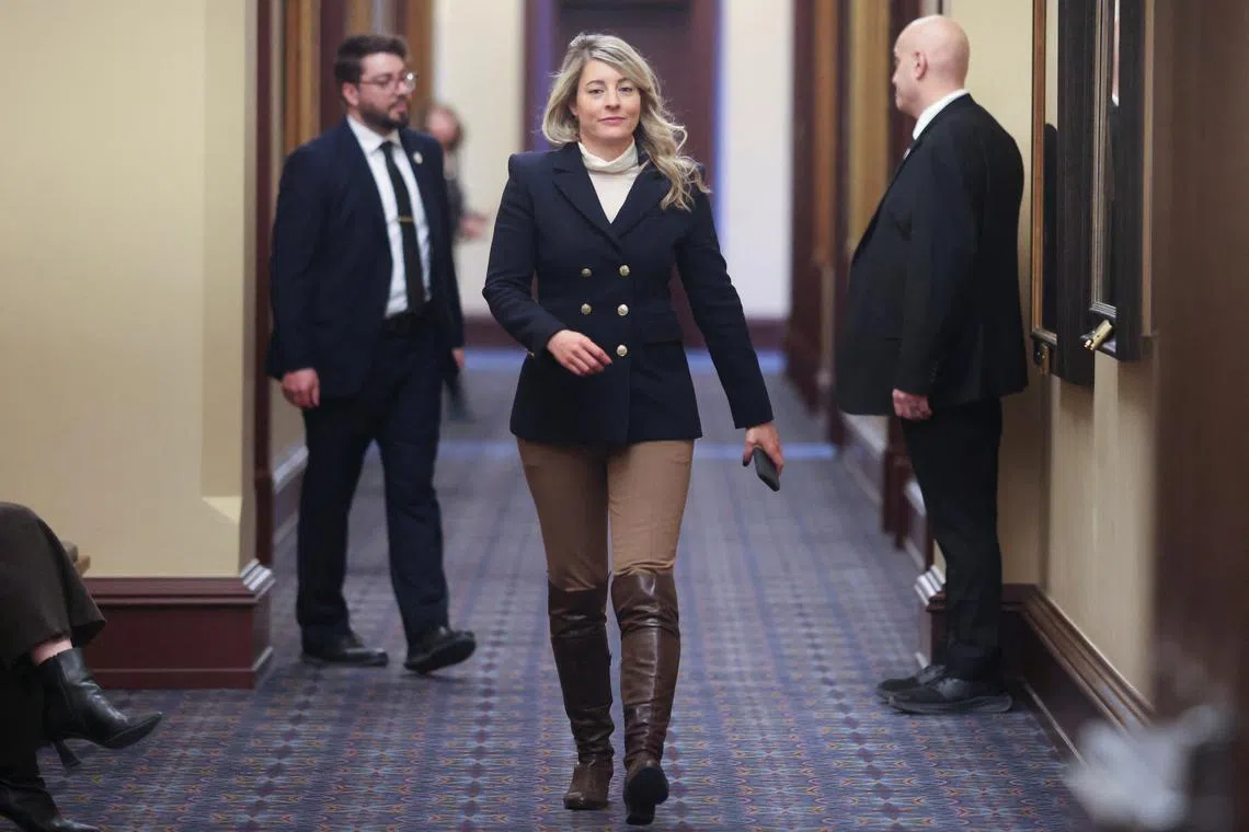 FILE PHOTO: Canada's Minister of Foreign Affairs Melanie Joly returns to a caucus meeting after a break on Parliament Hill in Ottawa, Ontario, Canada, January 8, 2025.  REUTERS/Patrick Doyle/File Photo