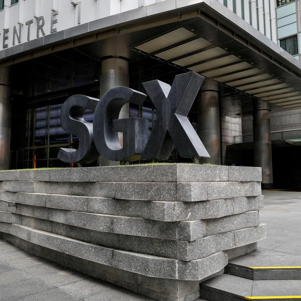 FILE PHOTO: Singapore Exchange's (SGX) logo is seen in the central business district, Singapore, April 7, 2020. REUTERS/Edgar Su/File Photo/File Photo