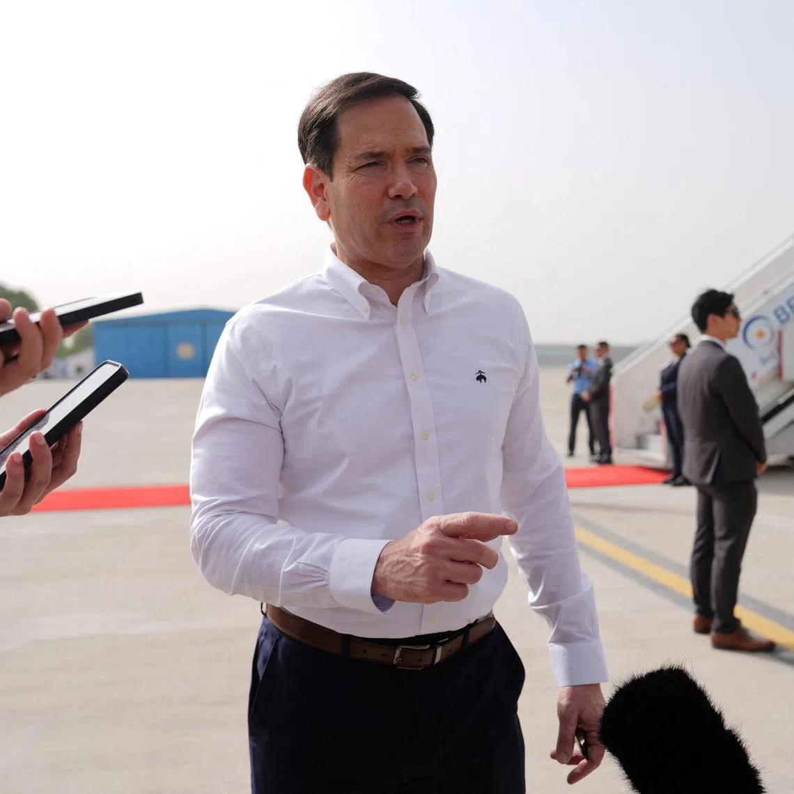 United States Secretary of State Marco Rubio speaks to the journalists before boarding his plane at Indira Gandhi International Airport in New Delhi, India, Monday, May 25, 2026.     Julia Demaree Nikhinson/Pool via REUTERS