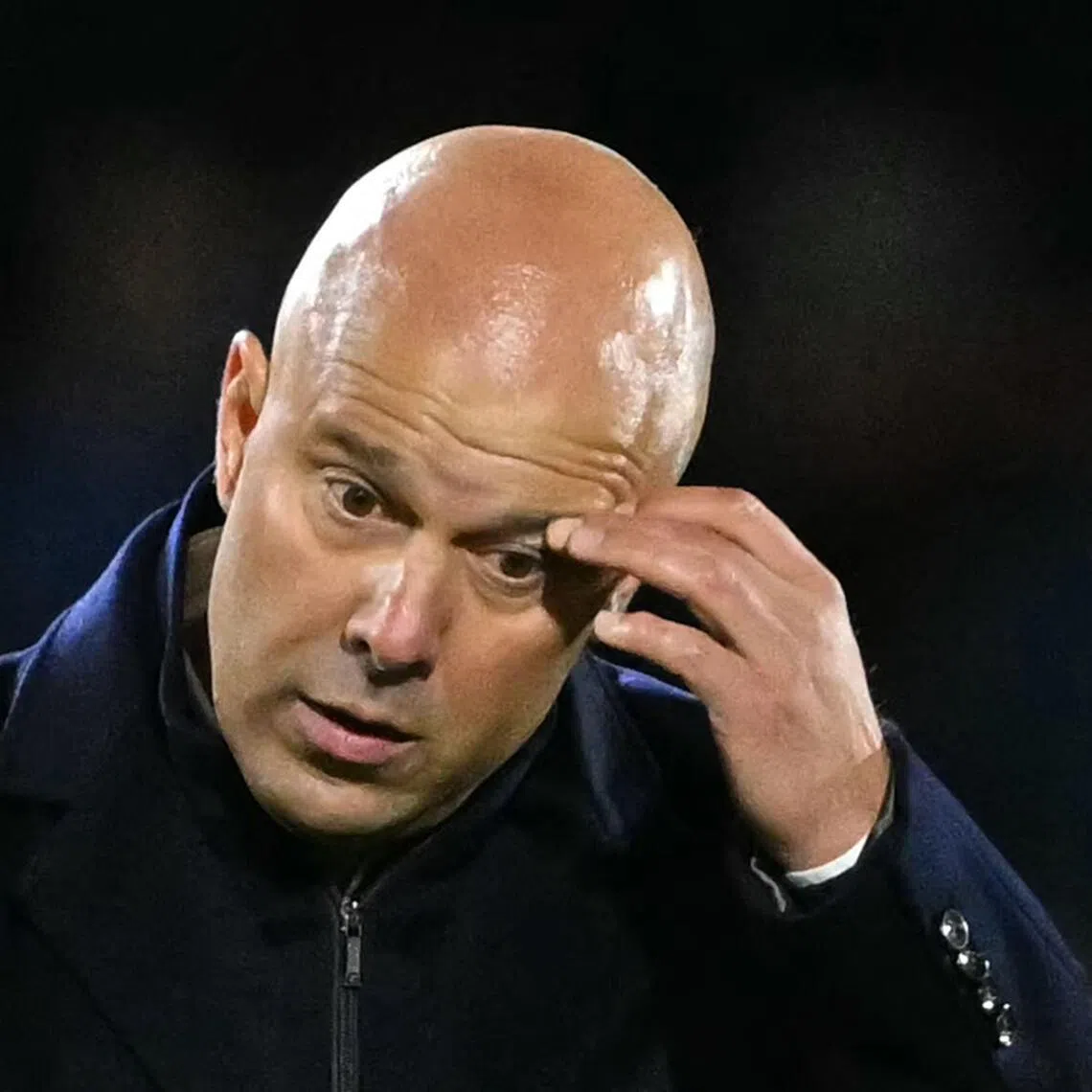 Liverpool's Dutch manager Arne Slot reacting after the final whistle following the 3-2 away loss against Brentford at the Brentford Community Stadium in London on Oct 25, 2025. 