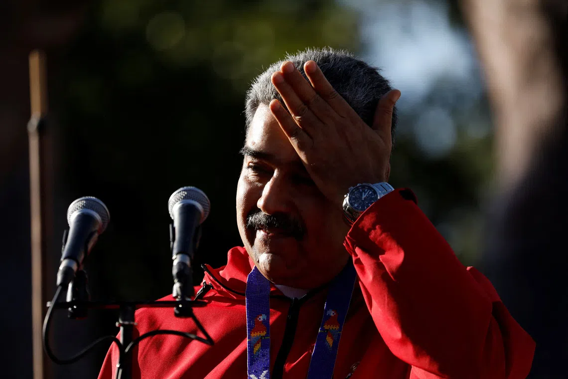 Venezuela's President Nicolas Maduro participates in a demonstration to mark Indigenous Resistance Day, in Caracas, Venezuela, October 12, 2025. REUTERS/Leonardo Fernandez Viloria