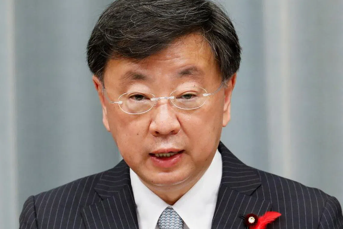 FILE PHOTO: Japan's Chief of Cabinet Secretary Hirokazu Matsuno announces new cabinet members at a news conference in Tokyo, Japan October 4, 2021. REUTERS/Kim Kyung-Hoon/File Photo