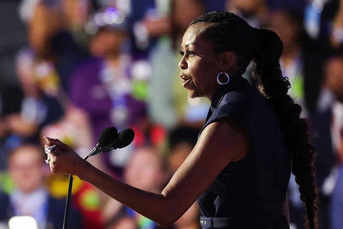 Former first lady of the United States Michelle Obama speaks during Day 2 of the Democratic National Convention (DNC) in Chicago, Illinois, U.S., August 20, 2024. REUTERS/Brendan Mcdermid