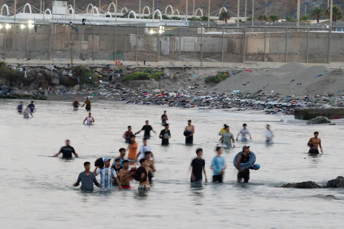 Italy imposed border controls on arrivals from Spain after tens of thousands of migrants stormed the Spanish enclave of Ceuta, in Africa, on July 30.