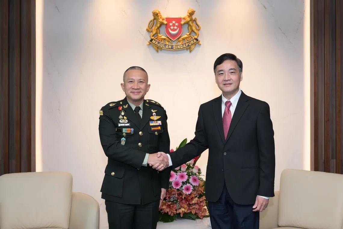 Chief of Defence Forces of the Royal Thai Armed Forces General Songwit Noonpackdee (left), called on Senior Minister of State for Defence Mr Heng Chee How (right) at the Ministry of Defence on May 29 morning. 