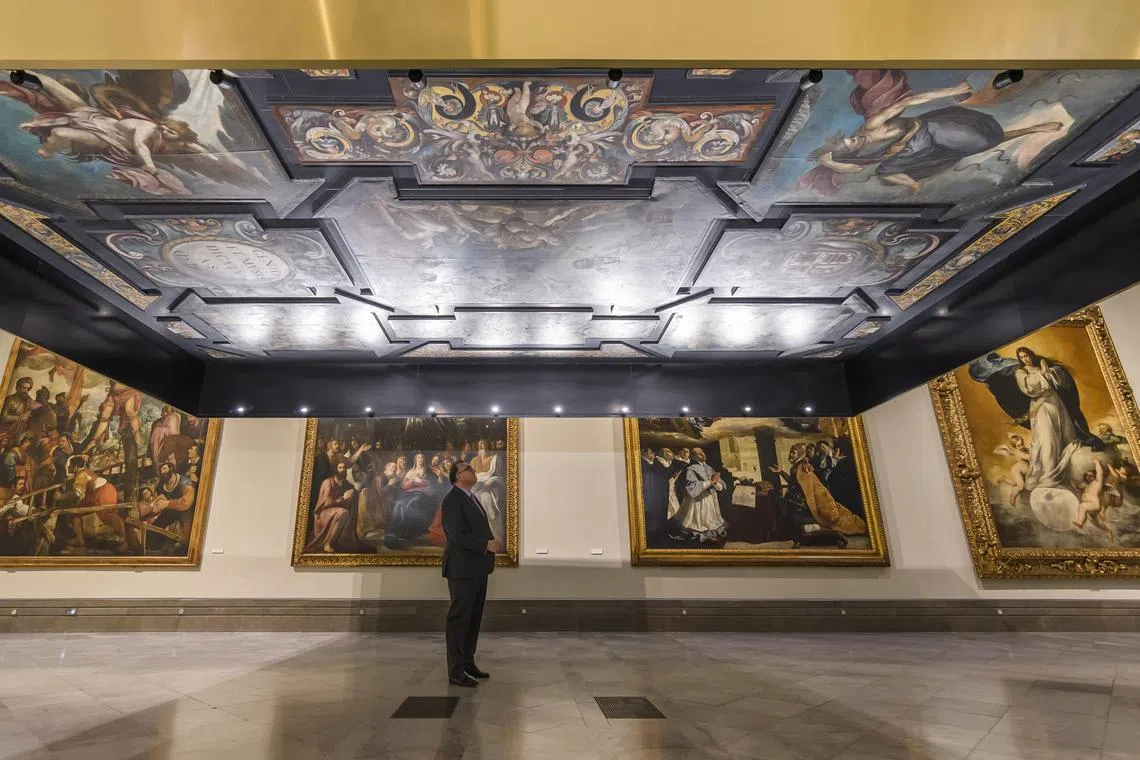 A visitor is seen at the exhibition 'Renaissance Art in Seville' inaugurated at the Fine Arts Museum in Seville, Spain, 01 December 2022.  