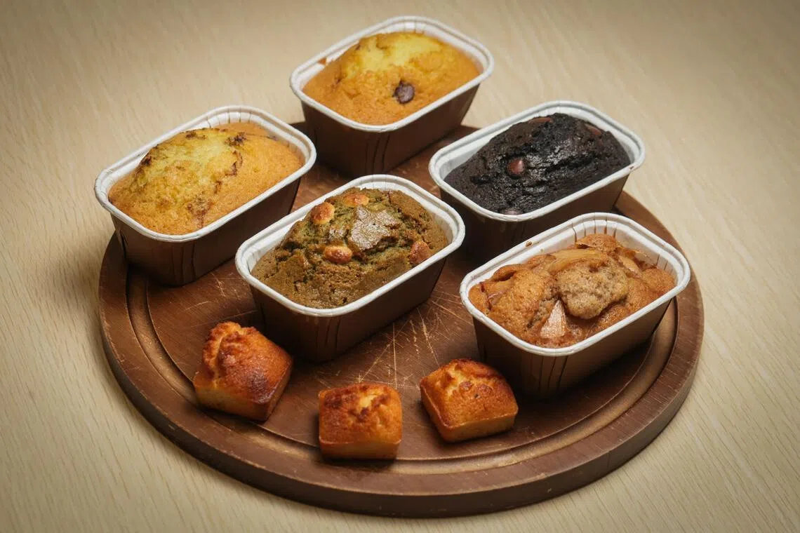 Mini Financiers (front) and Mini Loaf Cakes in (clockwise from left) Blueberry-Lemon, Chocolate Chip, Double Chocolate Chip, Apple Pie and Matcha White Chocolate.