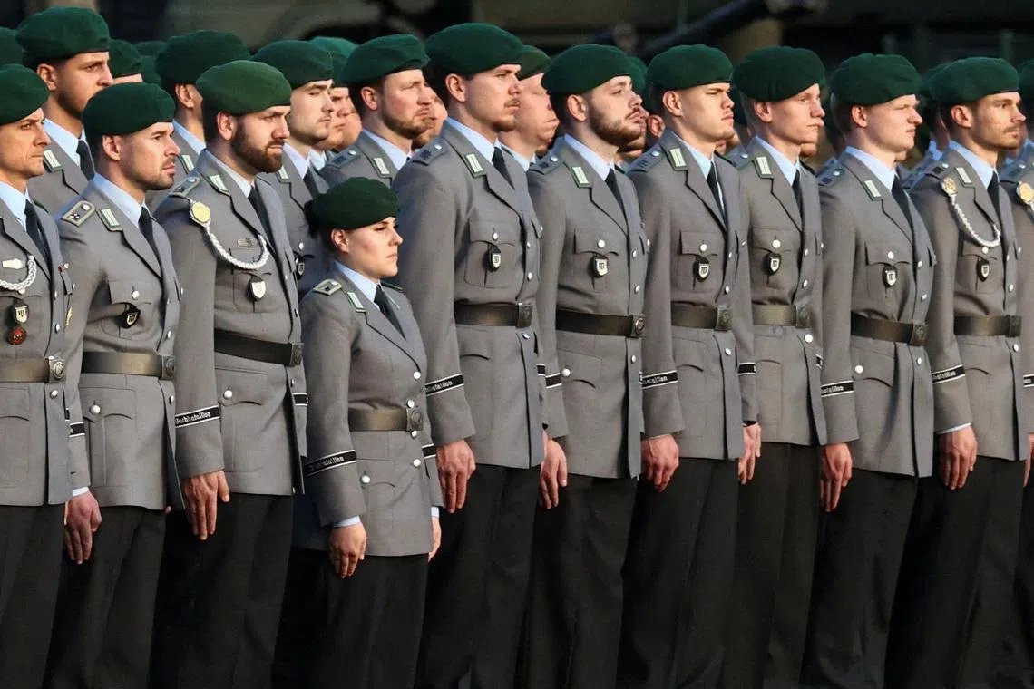 Germany works to clarify new rules on fighting-age men leaving country