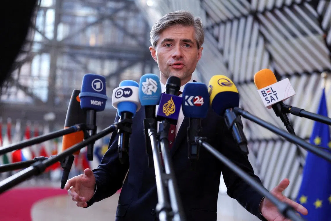 FILE PHOTO: Lithuania's Foreign Minister Kestutis Budrys speaks to members of the media as he arrives to attend a European Union Energy and Foreign Affairs ministers meeting in Brussels, Belgium March 16, 2026. REUTERS/Omar Havana/File Photo