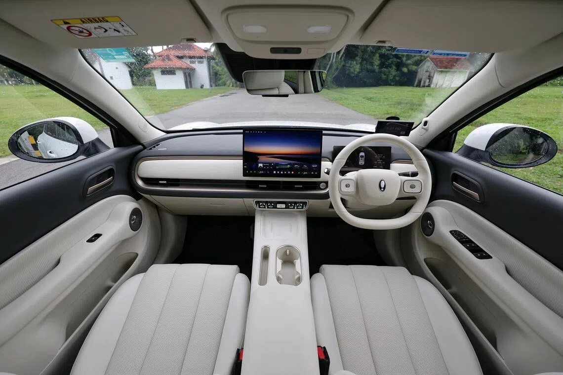 Cushy cabin: The interior exudes a premium feel that goes beyond its white vegan upholstery.