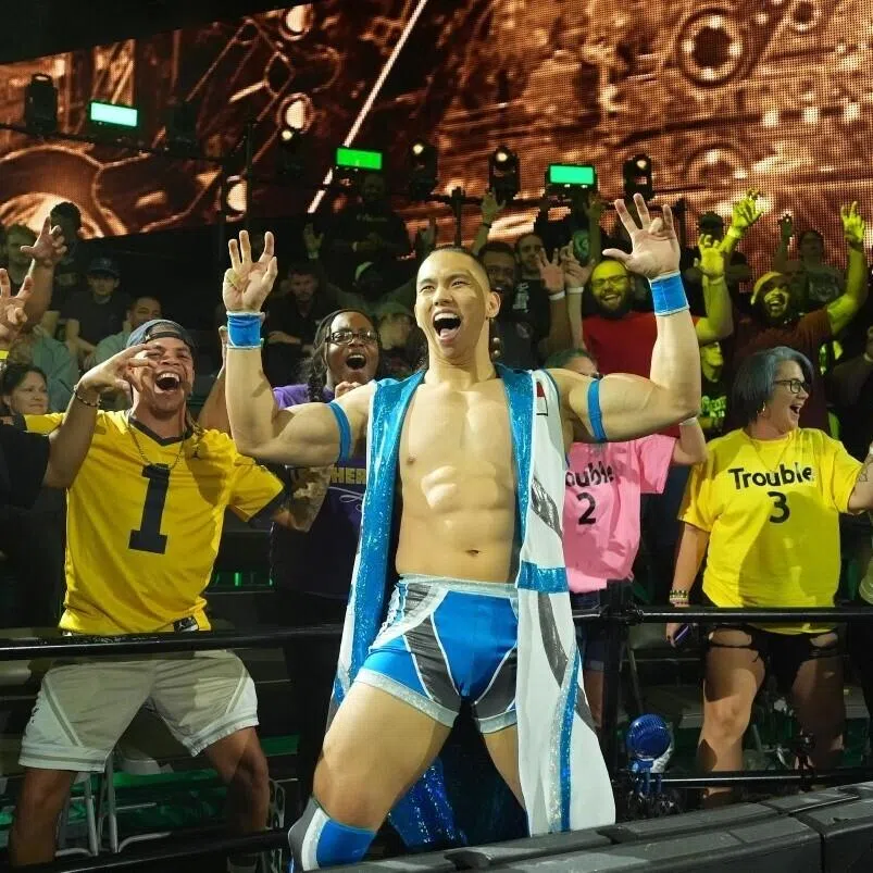 Tan was scouted by WWE officials during a tryout in Shanghai in 2019.