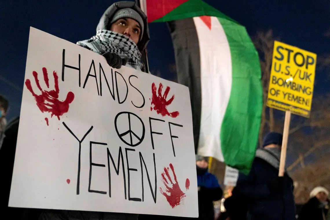 People protest the U.S. and UK strikes across Yemen against Iran-backed Houthi forces, at a rally in Seattle, Washington, U.S., January 12, 2024. REUTERS/David Ryder