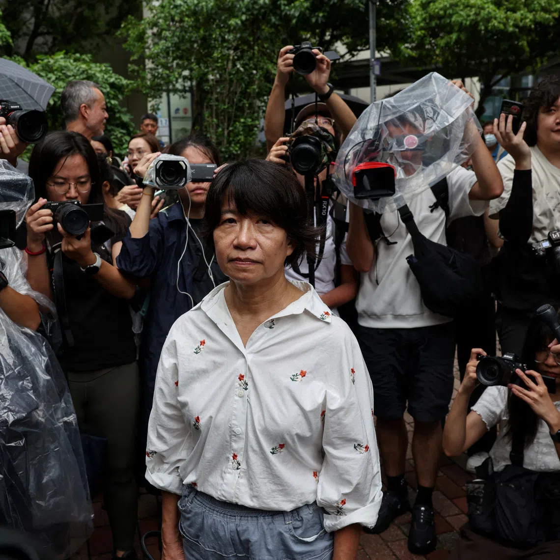 Elizabeth Tang Yin-ngor, wife of former Hong Kong Alliance leader Lee Cheuk-yan, leaves West Kowloon Magistrates' Courts following the conviction of three former Tiananmen vigil organizers charged with inciting subversion of state power, in Hong Kong, China, August 21, 2026. REUTERS/Tyrone Siu