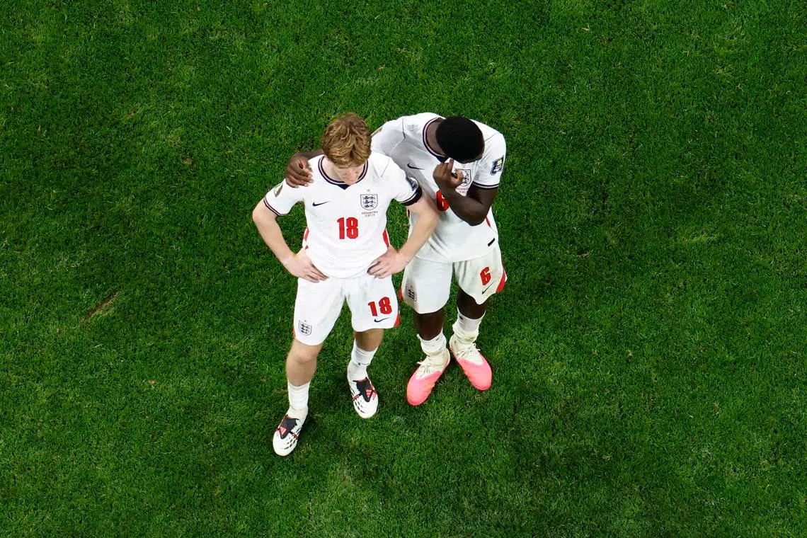 Soccer Football - FIFA World Cup 2026 - Semi Final - England v Argentina - Atlanta Stadium, Atlanta, Georgia, U.S. - July 15, 2026 England's Anthony Gordon and Marc Guehi look dejected after the match REUTERS/Brian Snyder