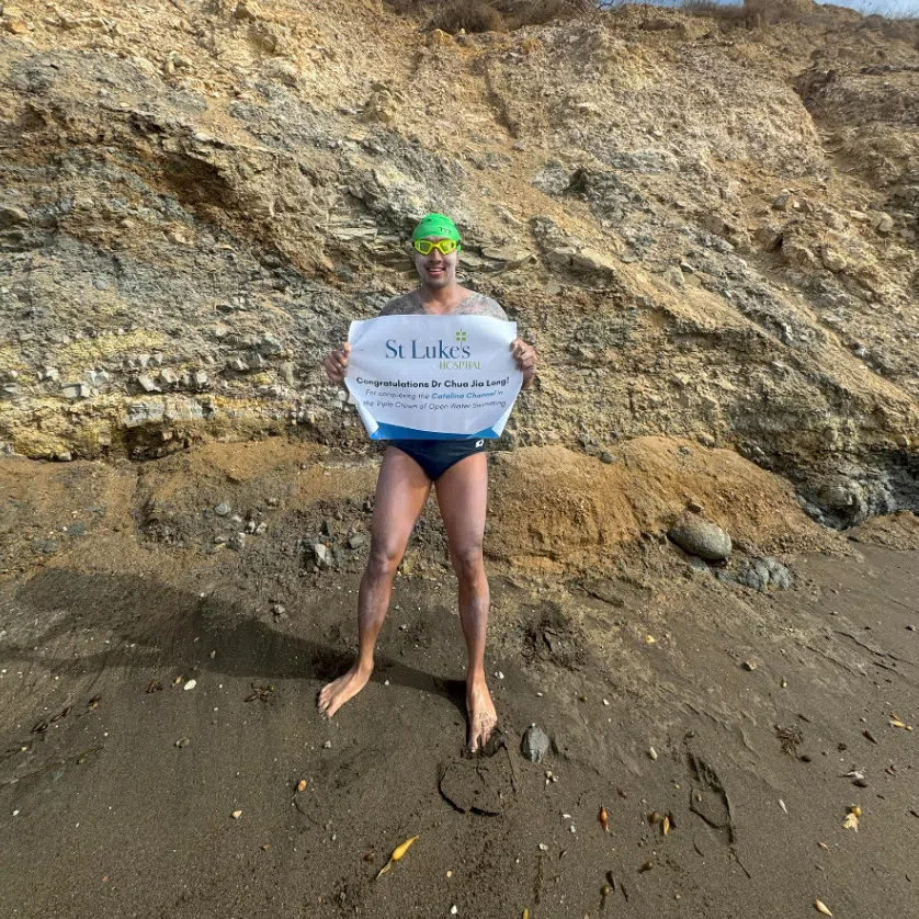 Navy doctor Chua Jia Long was accompanied by his wife, Ms Samantha Chia, who was in a kayak throughout the swims.