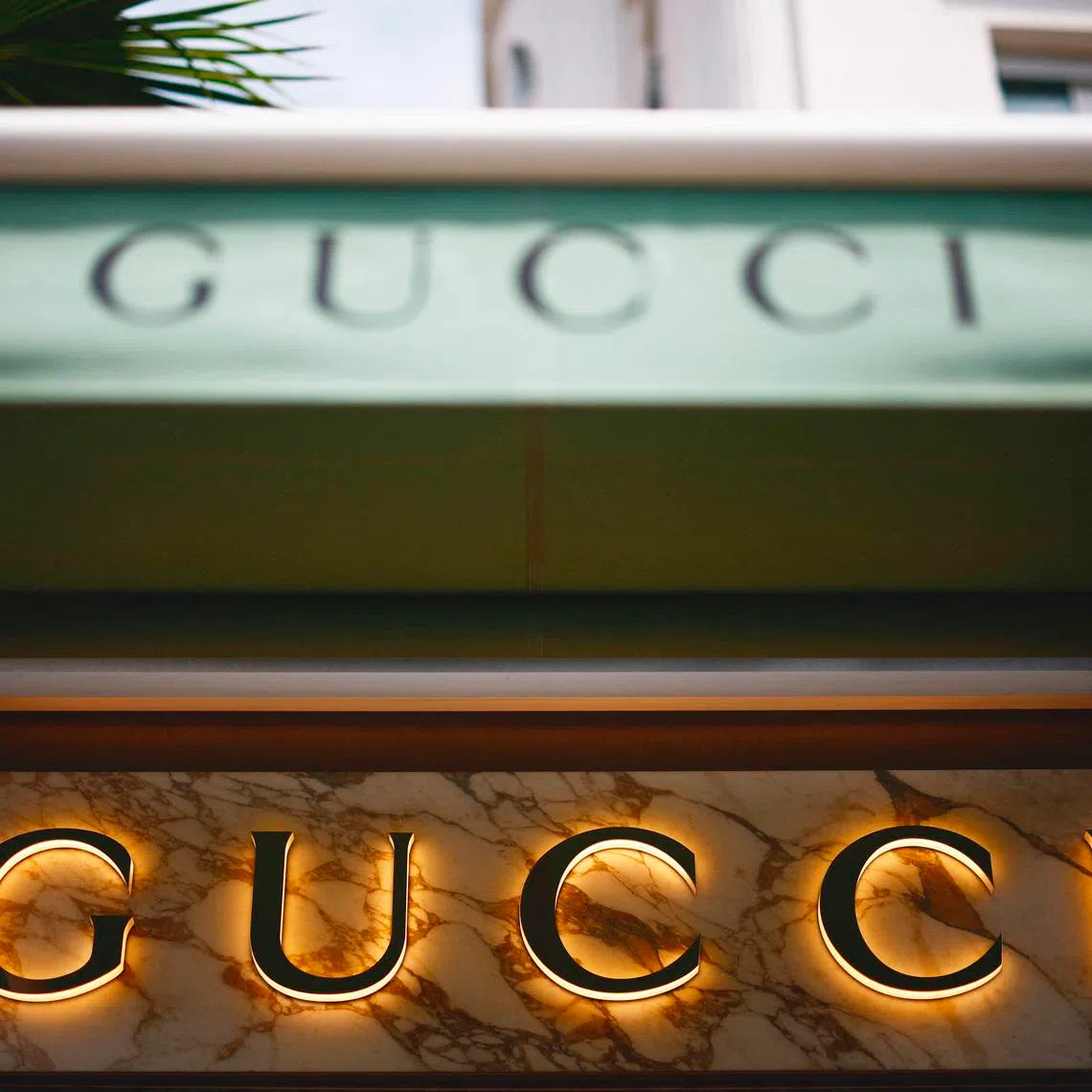 The logo of fashion house Gucci is seen outside a store in Cannes, France, May 16, 2024. REUTERS/Sarah Meyssonnier
