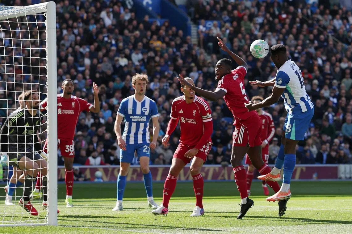Brighton & Hove Albion's Danny Welbeck heading in their first goal in the Premier League game against Liverpool at The American Express Community Stadium in Brighton on March 21, 2026.