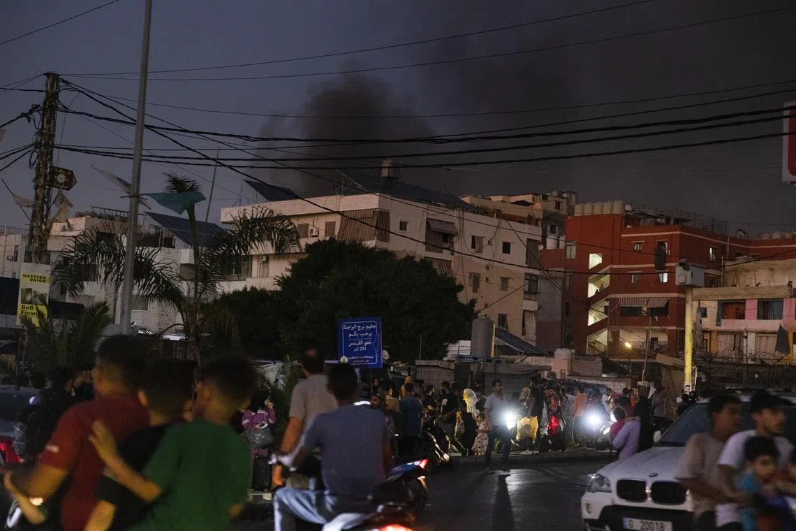 Israeli strikes reduced buildings to rubble in the Hezbollah stronghold of south Beirut on Sept 27.