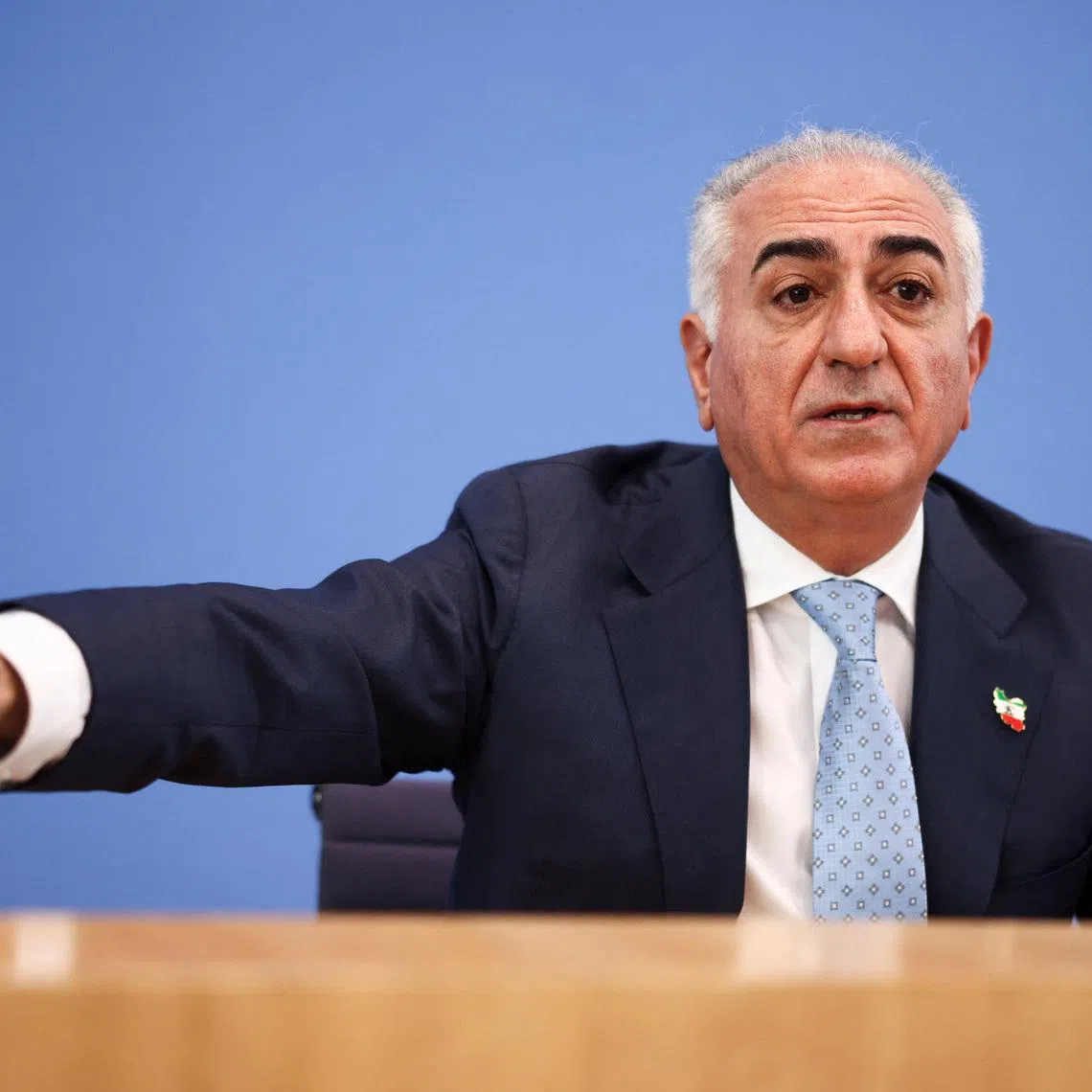 Reza Pahlavi, the exiled son of Iran's last shah and an Iranian opposition figure, gestures as he speaks during a press conference at the House of the Bundespressekonferenz in Berlin, Germany, April 23, 2026. REUTERS/Liesa Johannssen