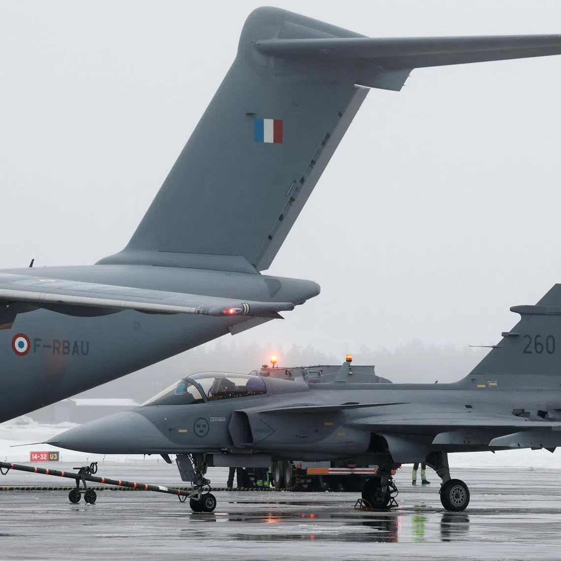 Swedish Air Force Saab JAS-39C Gripen fighter jet stands on the tarmac at Lulea-Kallax air base as part of NATO's enhanced Forward Presence (eFP) deployment to reinforce regional security, in Lulea, Sweden, February 24, 2025. REUTERS/Benoit Tessier