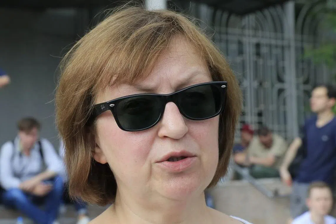 FILE PHOTO: Galina Timchenko, CEO of online news portal Meduza, speaks during an interview outside a court building in Moscow, Russia, on June 8, 2019. REUTERS/Tatyana Makeyeva/File Photo