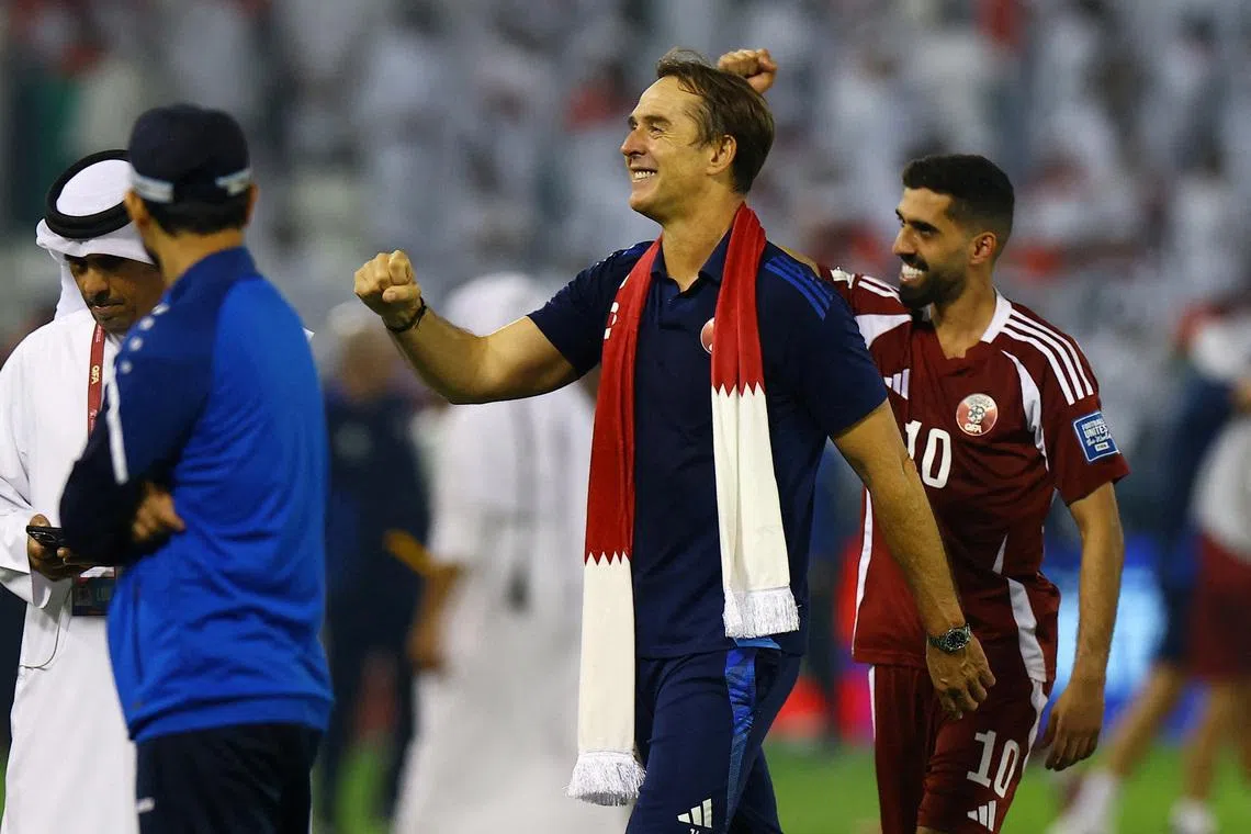FILE PHOTO: Soccer Football - FIFA World Cup - AFC Qualifiers - Group A - Qatar v United Arab Emirates - Jassim Bin Hamad Stadium, Doha, Qatar - October 14, 2025 Qatar coach Julen Lopetegui celebrates with Hassan Al Haydos after qualifying for the FIFA World Cup REUTERS/Ibraheem Al Omari/File Photo