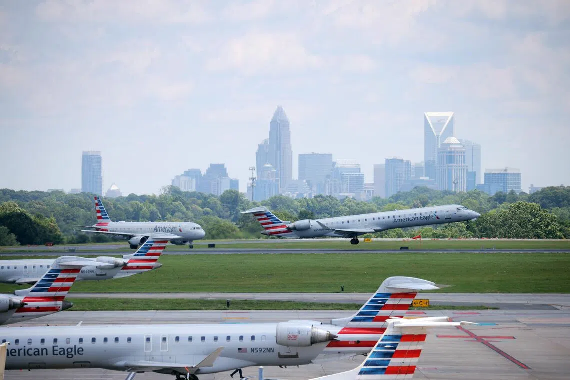 An American Eagle passenger jet lands at Charlotte Douglas International Airport in Charlotte, N.C., June 6, 2024. A stowaway was found dead in the wheel well of an American Airlines plane after it arrived at Charlotte Douglas International Airport in Charlotte, N.C., from Europe on Sunday, Sept. 28, 2025, the police said. (Travis Dove/The New York Times)