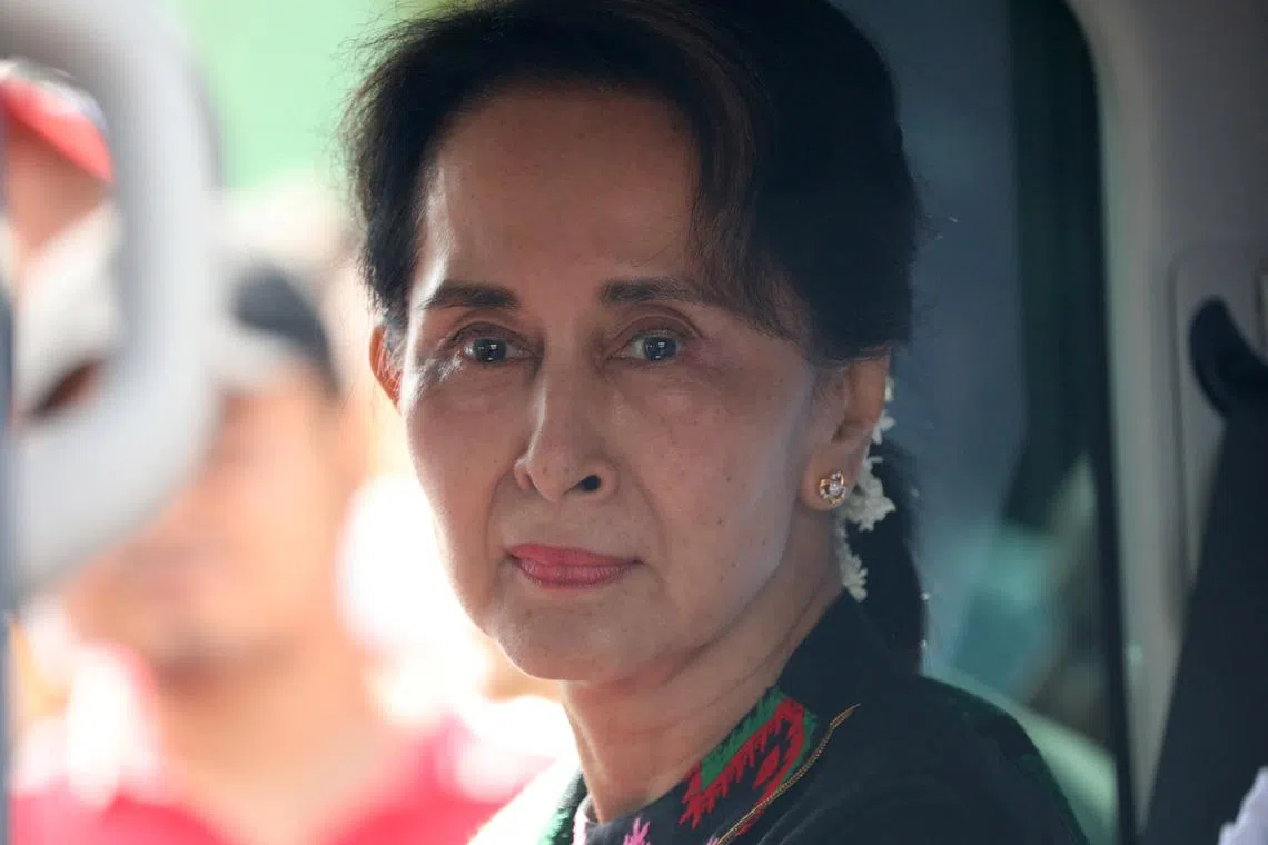 FILE PHOTO: Myanmar's State Counsellor Aung San Suu Kyi arrives at a school in Kawhmu, Yangon, Myanmar, July 18, 2019. REUTERS/Ann Wang/File Photo