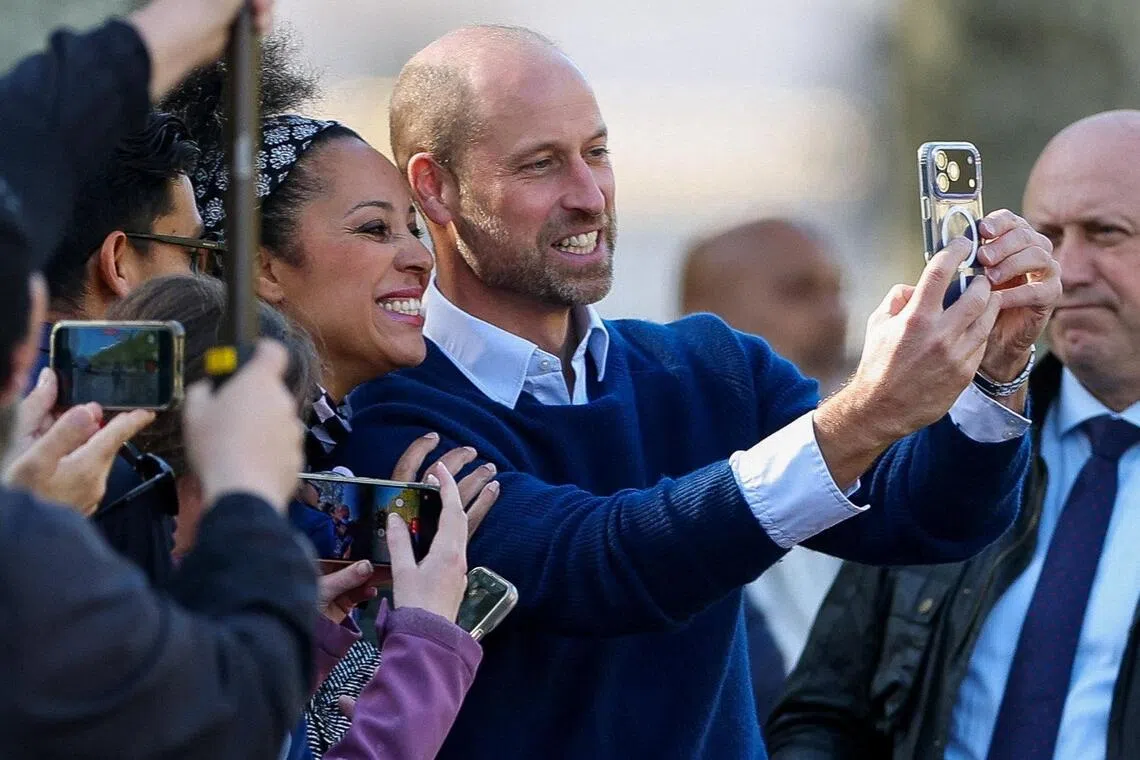 Prince William poses for a picture as he joins cricket stars for an informal game in the lead up to the annual Earthshot Prize awards.