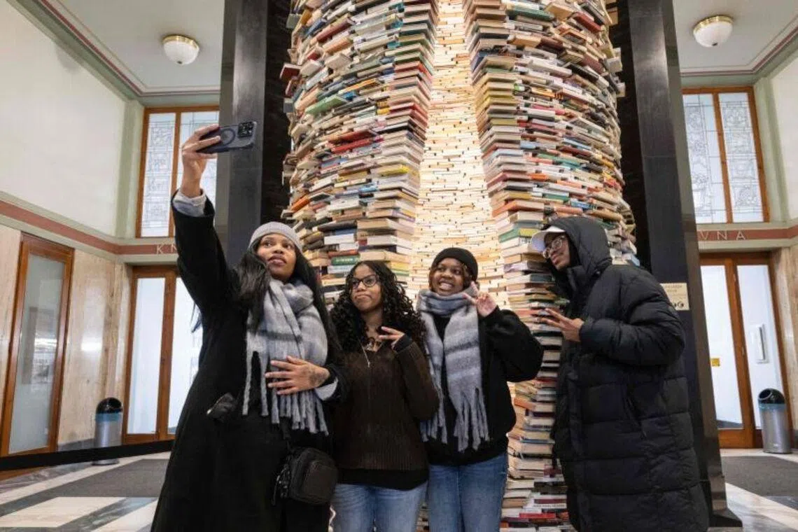 The Idiom, a statue by Slovak artist Matej Kren, is a cylindrical tower of 8,000 books.