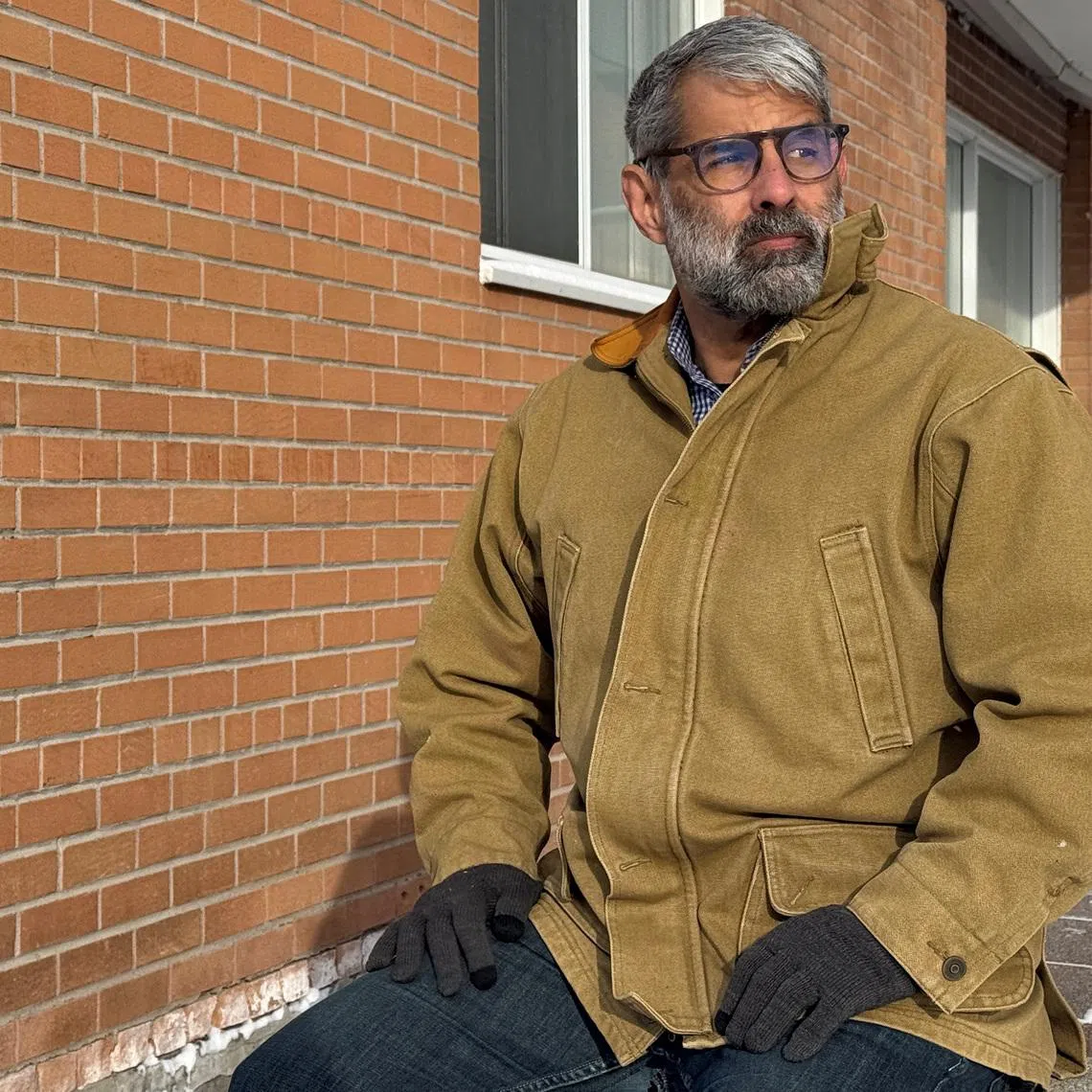 Venezuelan expat Luis Cabana poses near his apartment in Ottawa, Ontario, Canada, January 28, 2026. Picture taken with a mobile phone.  REUTERS/Kyaw Soe Oo