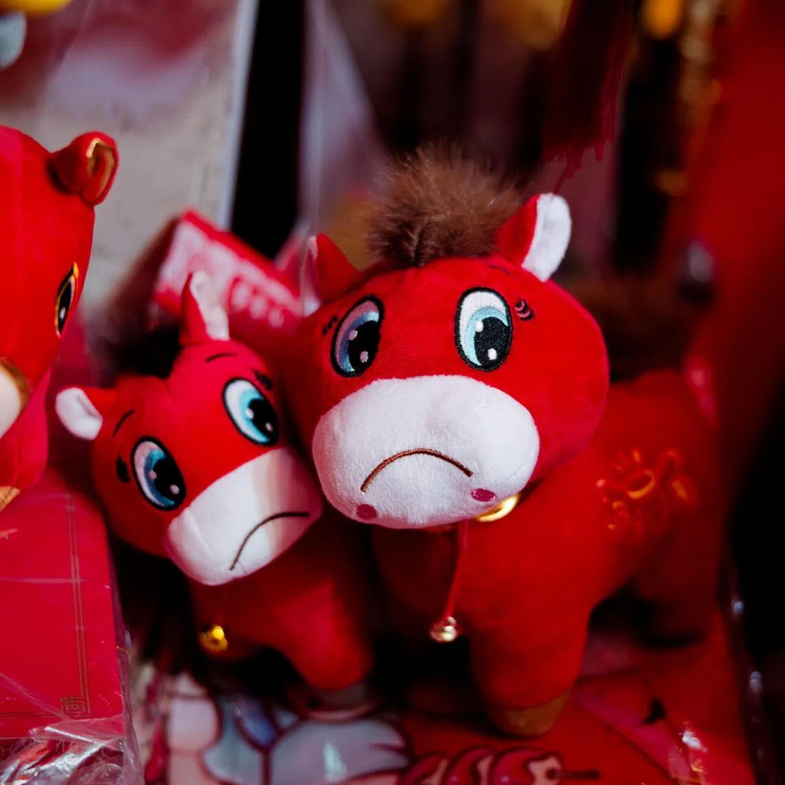 'Crying horse' ornaments stand on display in a shop for the upcoming Chinese New Year in Shanghai.